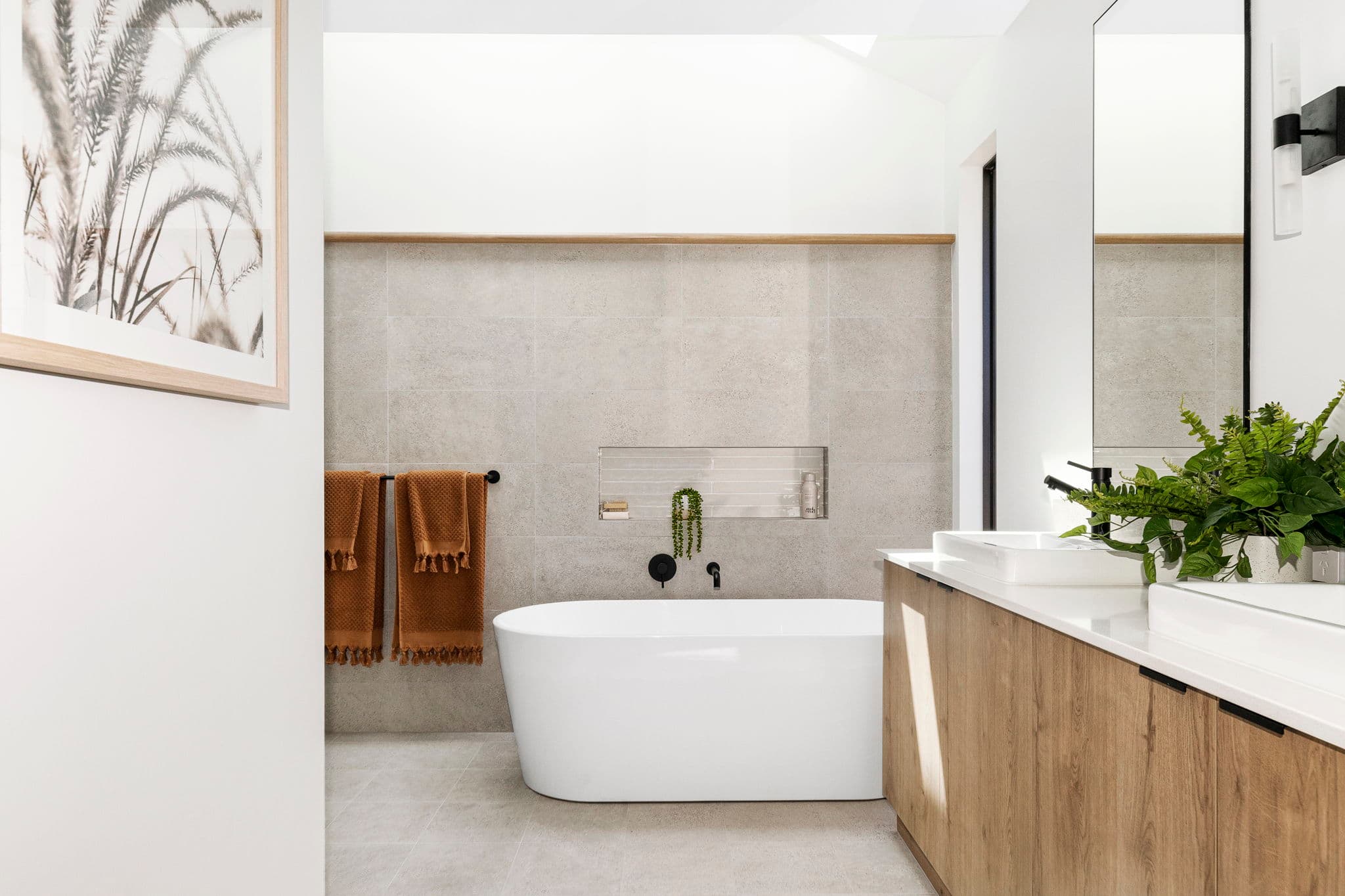A photo of the stylish and relaxing bathroom of Summit South West's Siluma display home in Bunbury